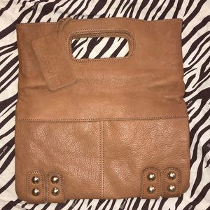 Brown leather clutch